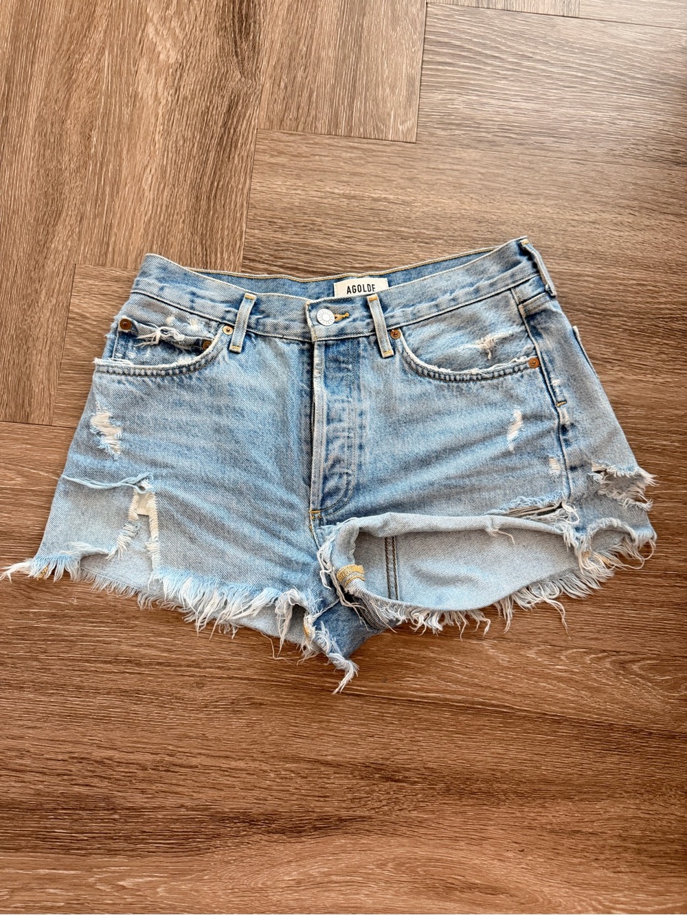 Agolde Light Wash Distressed Cutoff Jean Shorts
